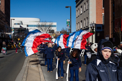 Stamford, CT, USA - November 24, 2013:The local marching band members are some of the many participants entertaining the people  in the city of Stamford annual \