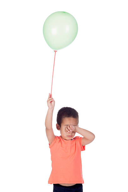 istock little boy with orange   shirt 467542985