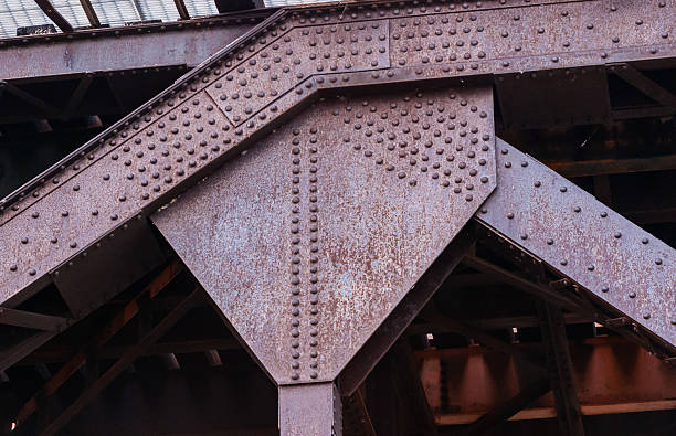 istock Industrial metal riveted girder joint bend 467543698