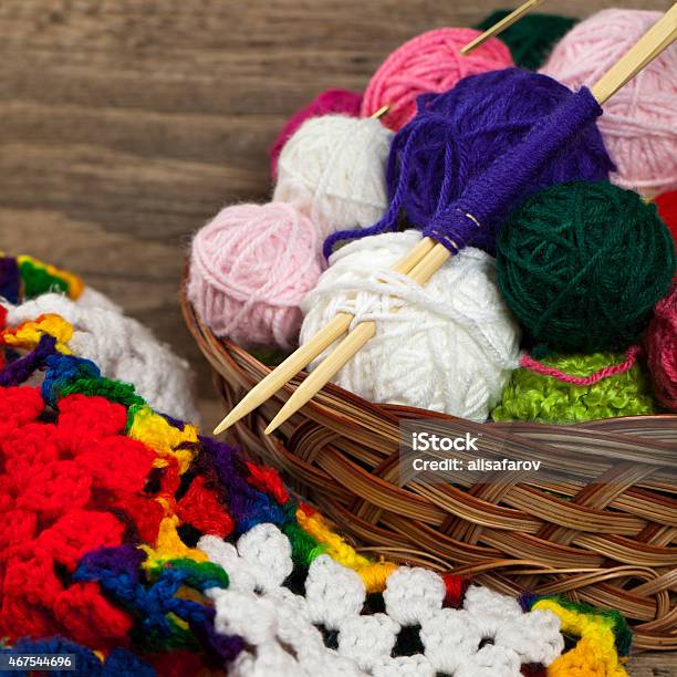 Multicolored Plaid Squares Of Crocheted Stock Photo - Download Image Now - 2015, Abstract, Adult