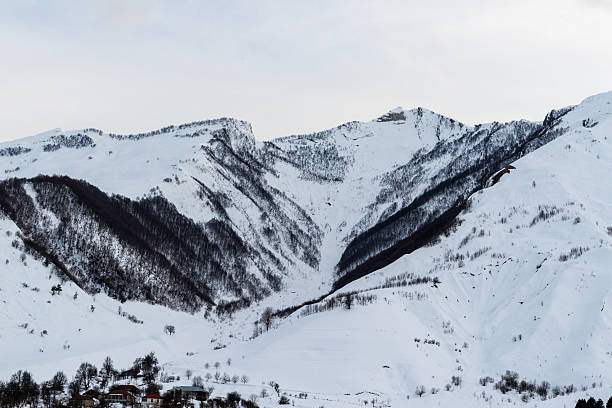 istock Caucasian mountains  and amazing clouds 467545360