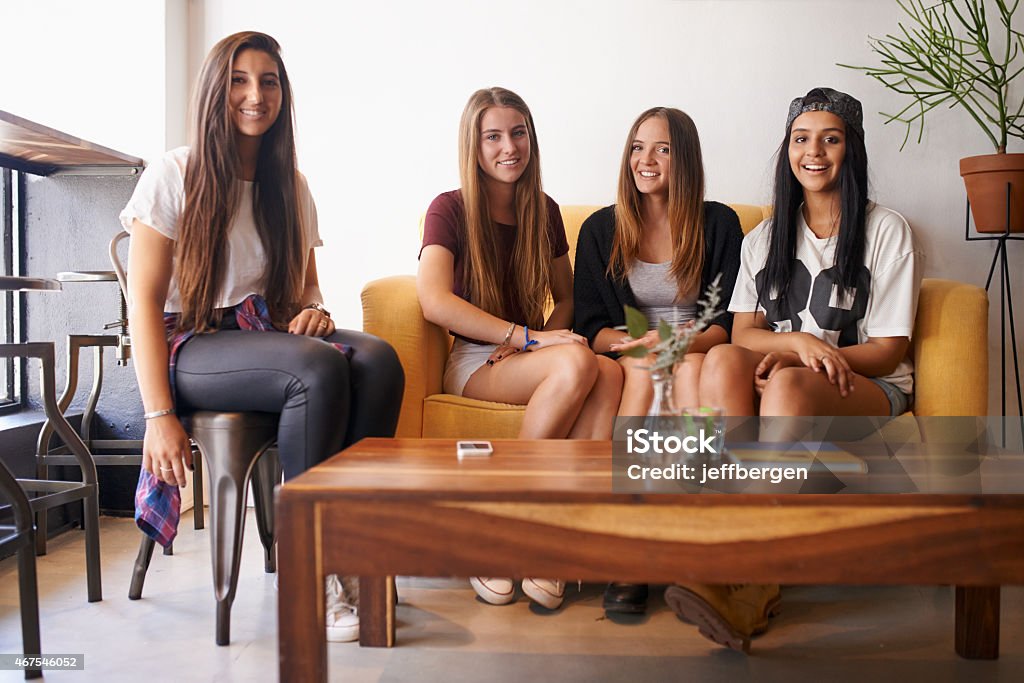 Friends? More like sisters Portrait of a group of teenage girls hanging out together indoorshttp://195.154.178.81/DATA/istock_collage/a14/shoots/785321.jpg 2015 Stock Photo