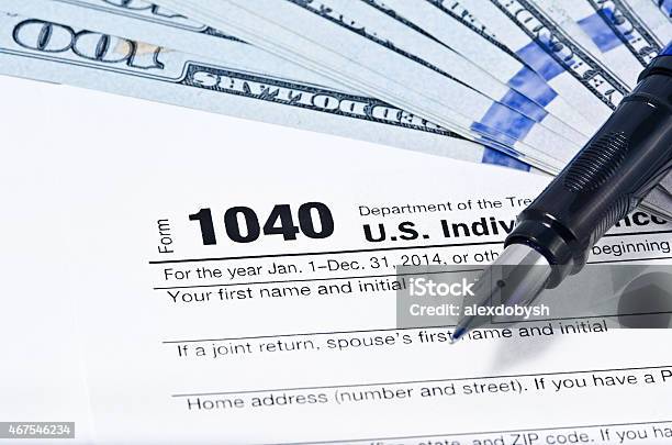 Income Tax Form Stock Photo - Download Image Now - 1040 Tax Form, 2015, April