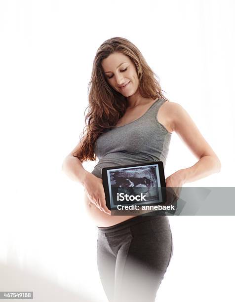 Picture Perfect Pregnancy Stock Photo - Download Image Now - 2015, Abdomen, Adult