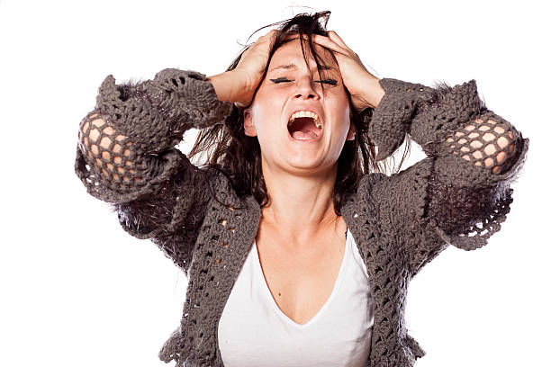istock Depressive messy and crying woman on white background 467549734
