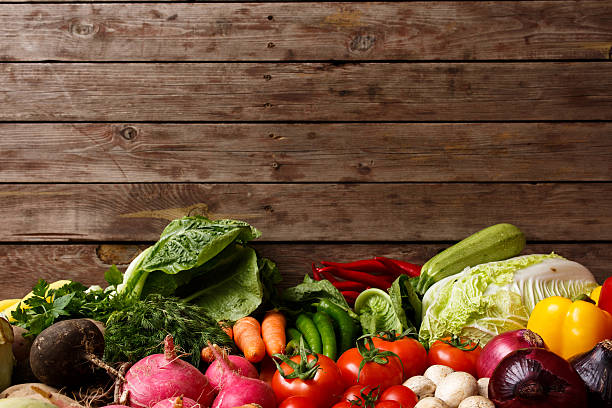 istock Healthy Organic Vegetables on a Wooden Background 467551374