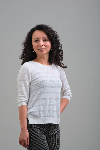 istock Female Asian smiling and posing 467552014