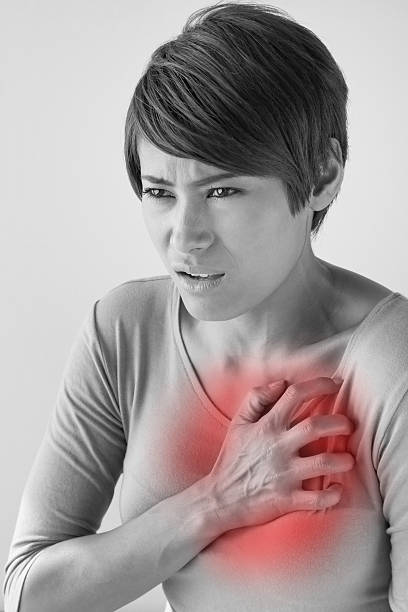 istock sick woman with sudden heart attack symptom 467553446