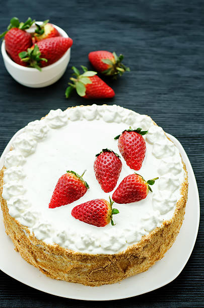 istock cake with cream and strawberries 467559258