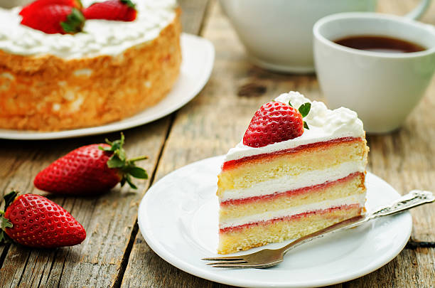 istock cake with cream and strawberries 467559262