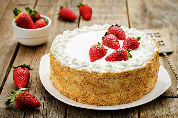 istock cake with cream and strawberries 467559570
