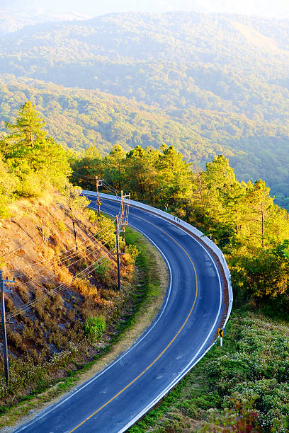 istock Beautiful Mountain Road with sunlight 467562542