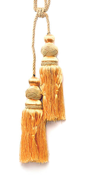 istock golden knot top tassel isolated on white background 467565639