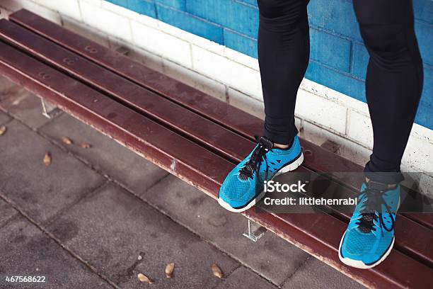 Closeup Of Athletes Running Shoes Stock Photo - Download Image Now - Bench, Running, 2015