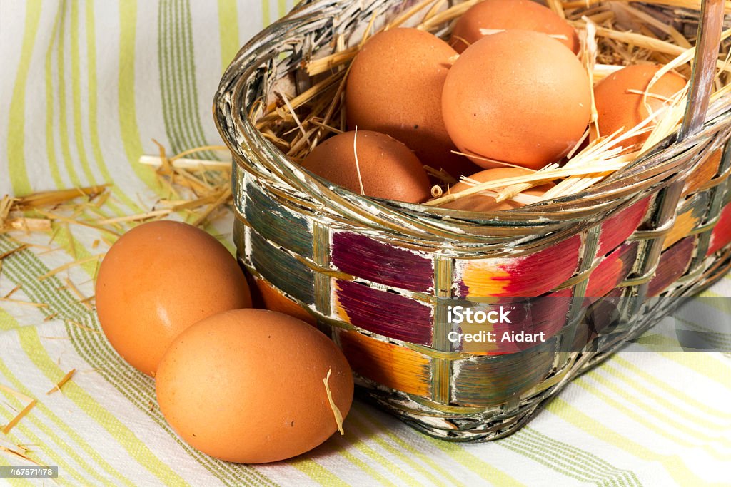 Fresh eggs in basket 2015 Stock Photo