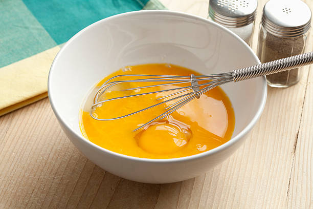 istock Beaten egg yolks with whisk 467571640