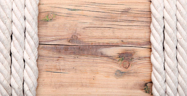 istock wood background with rope 467573963