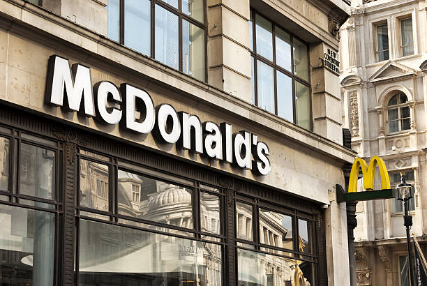 McDonald's London, United Kingdom - October 1, 2013: McDonald's Restaurant in London. McDonald's is the main fast-food restaurant chain in world. bucharest people stock pictures, royalty-free photos & images