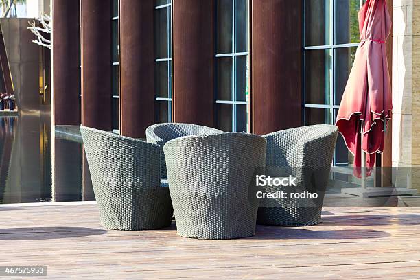Outdoor Furniture A Group Of Rattan Armchairs On Terrace Stock Photo - Download Image Now
