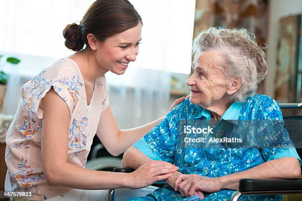 Senior Woman With Home Caregiver Stock Photo - Download Image Now - Senior Adult, Community Outreach, Home Caregiver