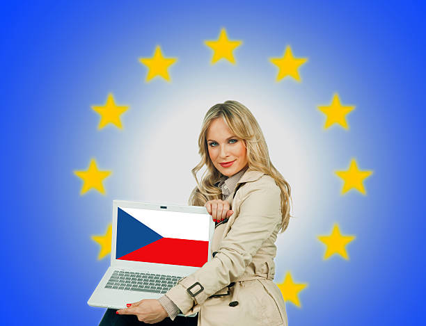 istock woman holding laptop with czech republic flag 467582607