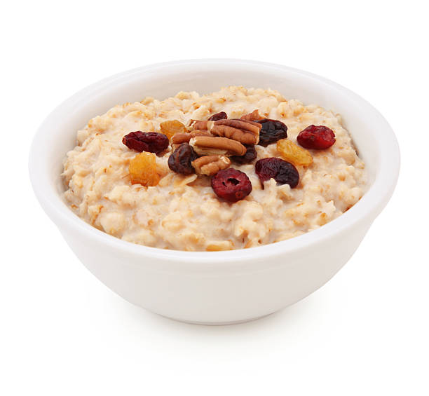 ciotola di farina d'avena con frutta secca (con percorso) - oatmeal raisin porridge nut foto e immagini stock