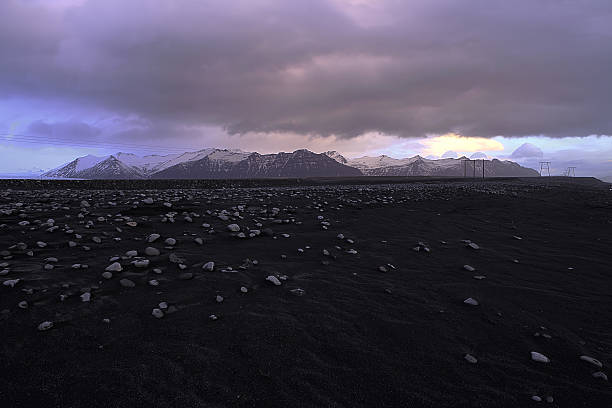 istock Jokulsarlon beach at sunrise with mountains and clouds 467582910