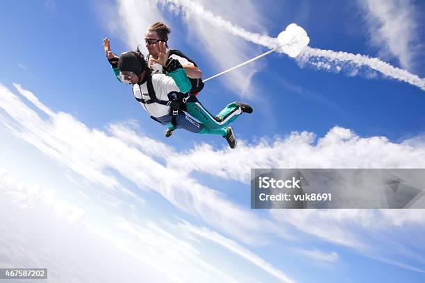 Tandem Skydiving Stock Photo - Download Image Now - Skydiving, Tandem, 2015