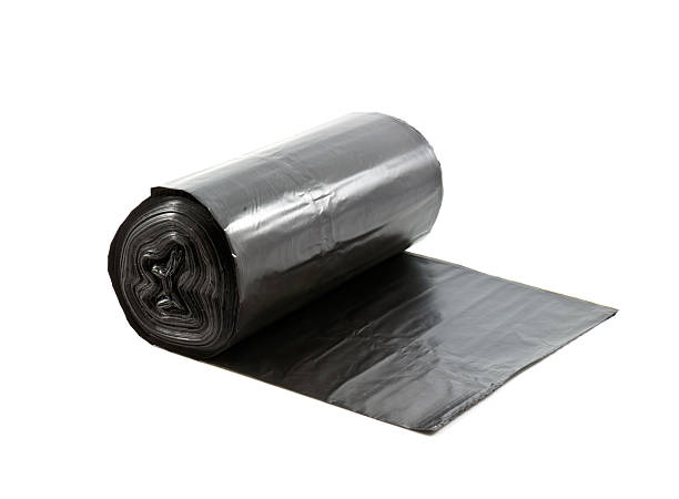 istock roll of disposable trash bags isolated over white background Sto 467588986
