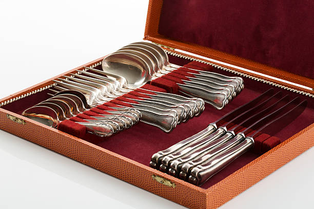 Old silver cutlery in cutlery tray