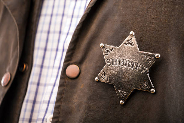 istock Close up of sheriff badge 467589648