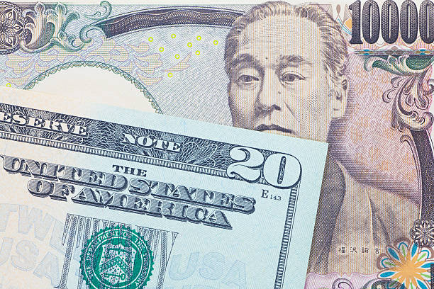 istock Japanese yen currency and dollar bank note 467591250