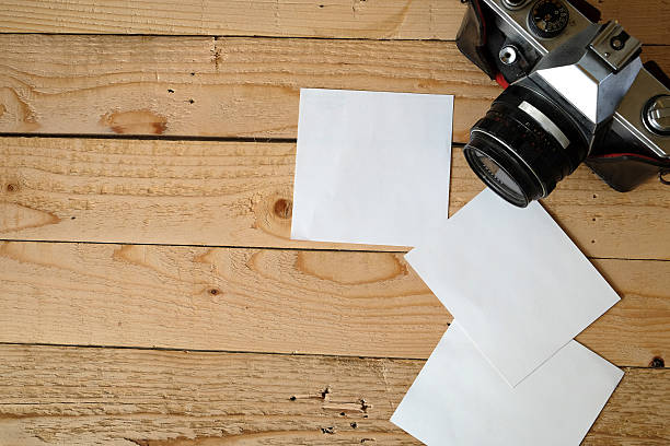 istock paper notes or photoframes with vintage camera 467591372
