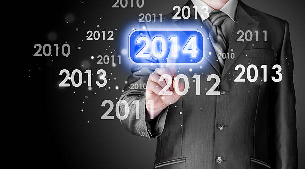 istock Businessman touching new year 2014 467594007