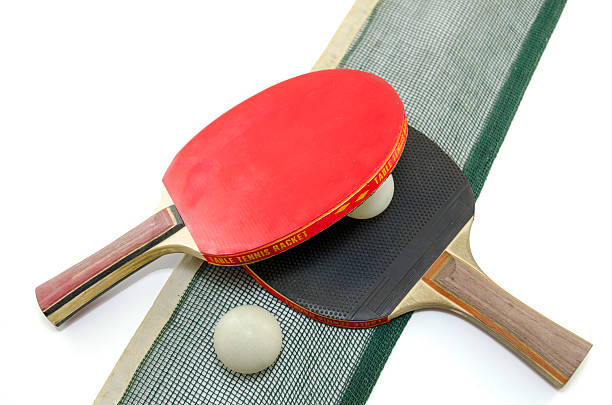 istock Two table tennis rackets and a net isolated 467595930