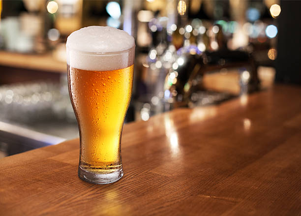 istock Beer glass on a bar. 467598055