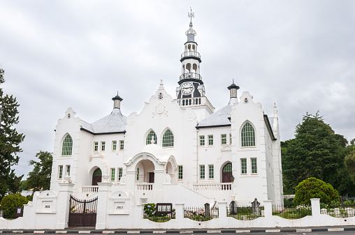 Dutch Reformed Church Swellendam, South Africa. Built 1911 in eclectic style - gables: baroque, windows: gothic, cupola: eastern, steeple: replica of famous steeple in Belgium
