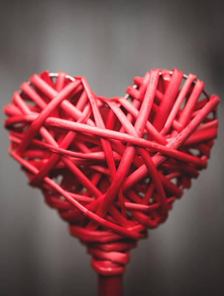 istock heart shape wood on defocus background 467600019