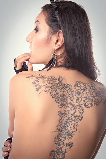 istock girl with a tattoo 467603766