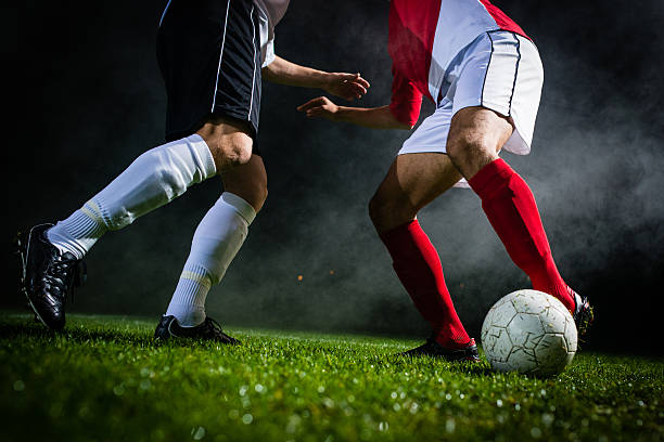 istock Soccer Player Dribbling A Ball 467604094