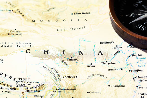istock Planning a Far-East tour: map of China, plus compass 467604479