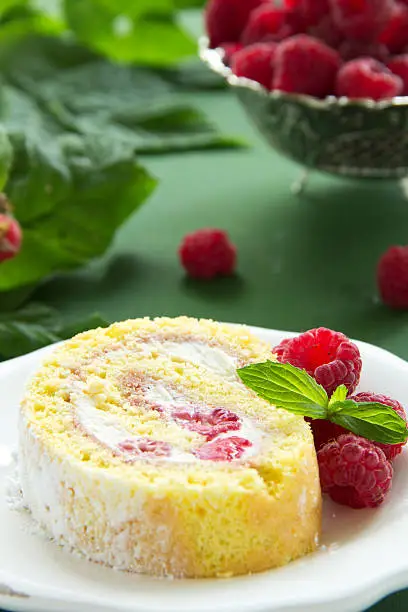 Roulade with raspberries and cream.