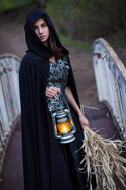 istock girl with a lantern on the bridge 467615768