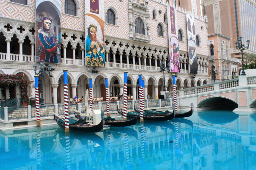 Las Vegas, Nevada, USA - July 4, 2012: Gondola rides at the Venetian Hotel and Casino on the Strip. Opened in 1999, the hotel has 4,049 rooms and the casino 120,000 square feet of gaming space.
