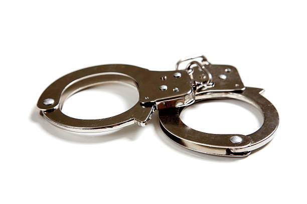 istock Set of handcuffs on white 467618258