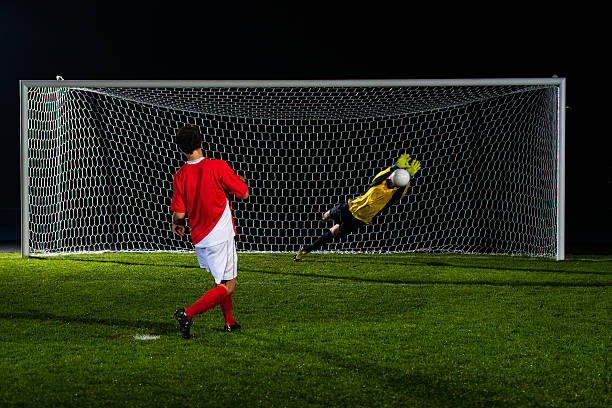istock Soccer Player Shooting At Goal 467618338