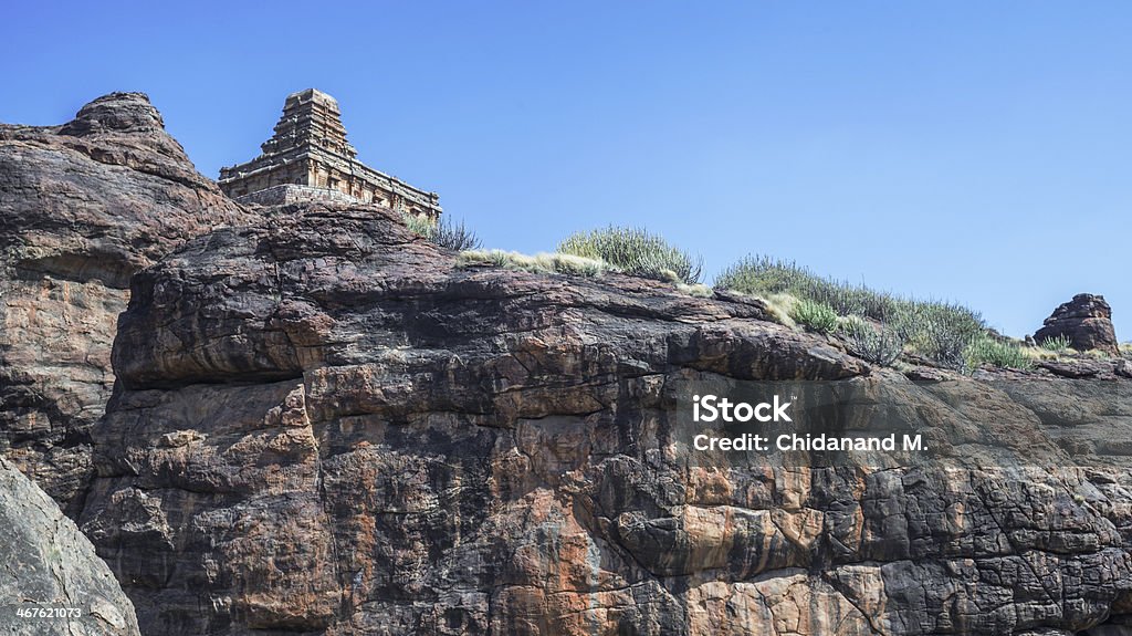 Upper Shivalaya, Badami Hill, Badami Fort, Karnataka, India View of Upper Shivalaya from Badami Hills and Fort. Chalukyan kings built these magnificent temples at Badami during their reign between 6th and 12th cent. CE. This is a very popular tourist destination and travellers from all over the world visit this place. Badami Stock Photo