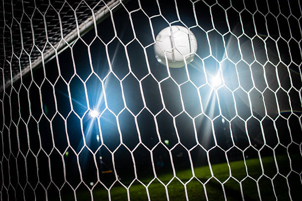 istock Soccer Ball In The Goal 467621222