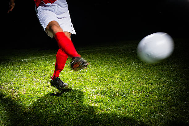 istock Soccer Player Kicking A Ball 467621542
