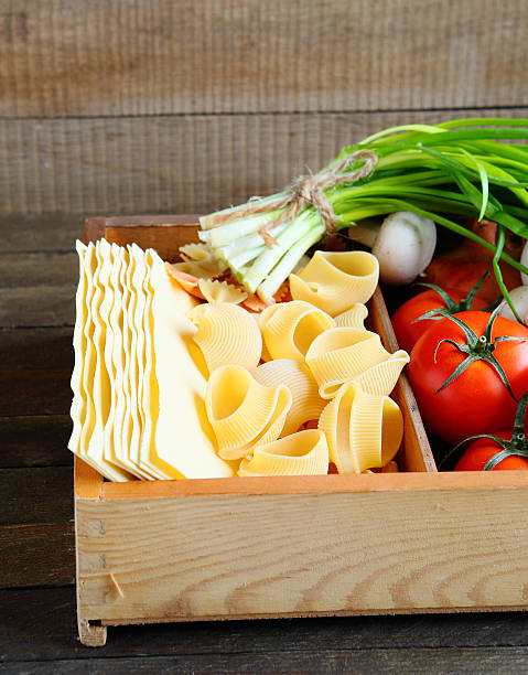 istock uncooked pasta in wooden box 467623325